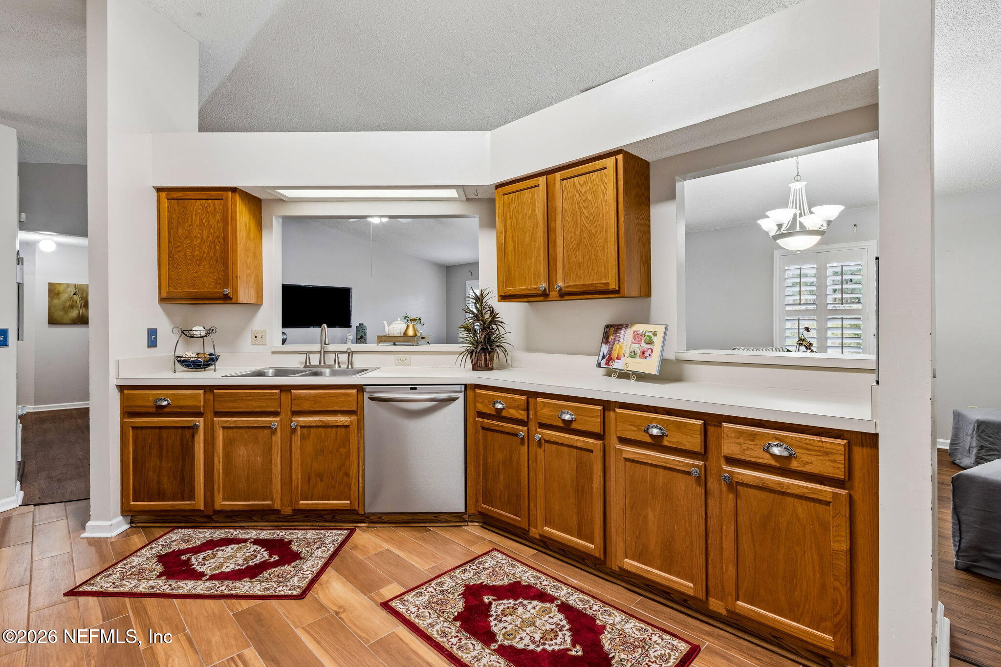 12648 Moose Road Jacksonville, FL 32226 - Photo 11 of 38 a spacious bathroom with a sink a mirror and a bathtub