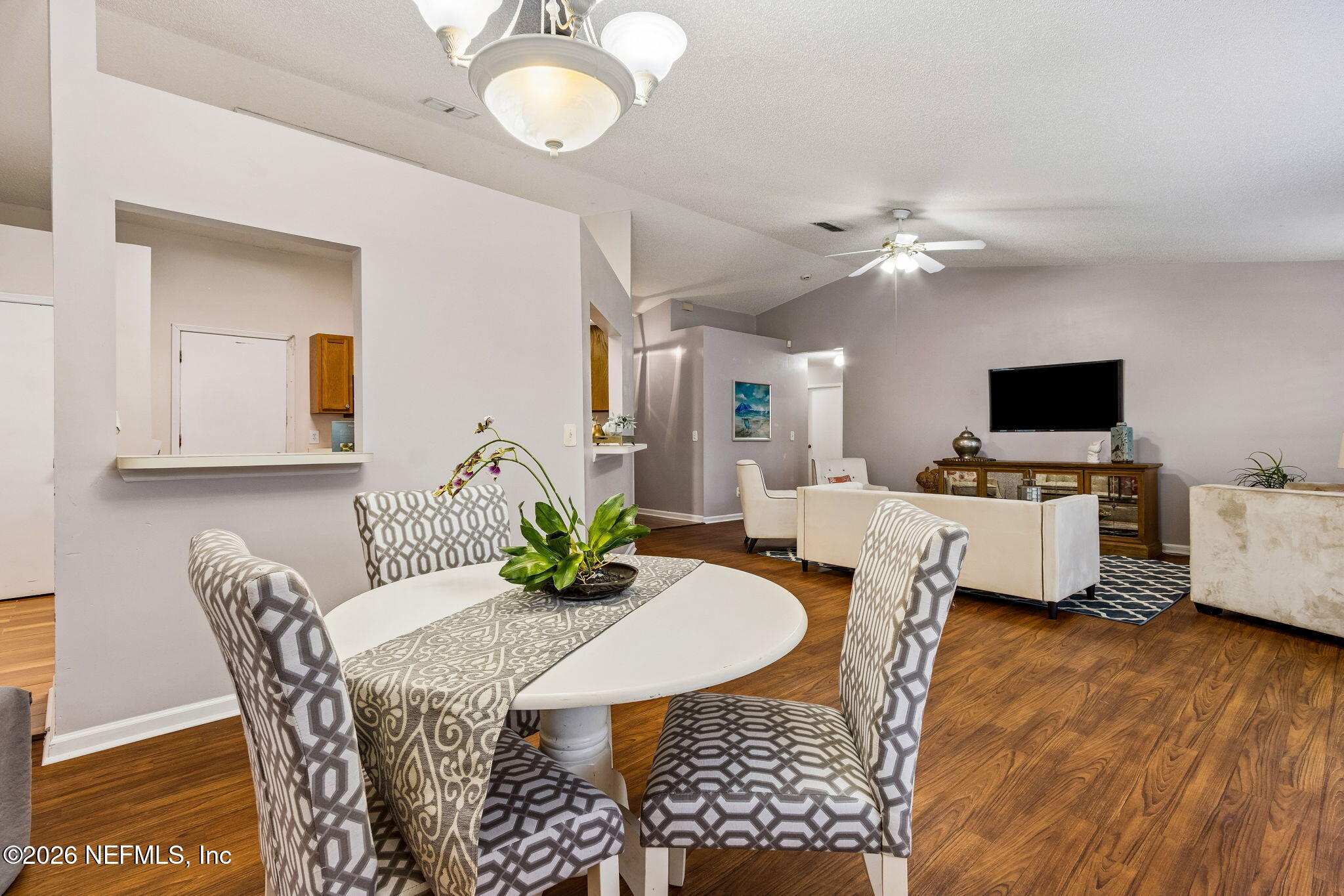 12648 Moose Road Jacksonville, FL 32226 - Photo 19 of 38 a view of a dining room with furniture