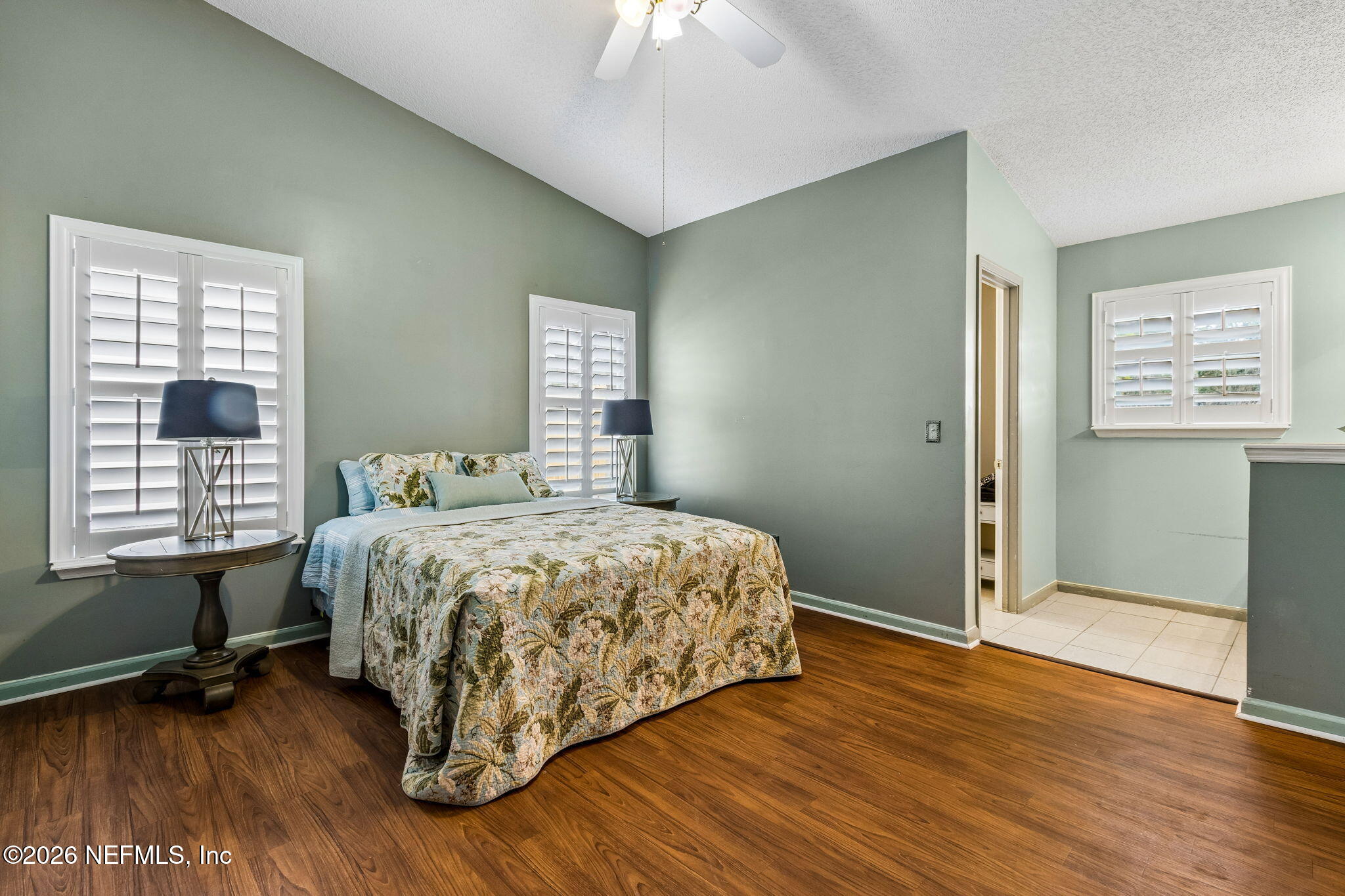 12648 Moose Road Jacksonville, FL 32226 - Photo 21 of 38 a bedroom with a bed and a window