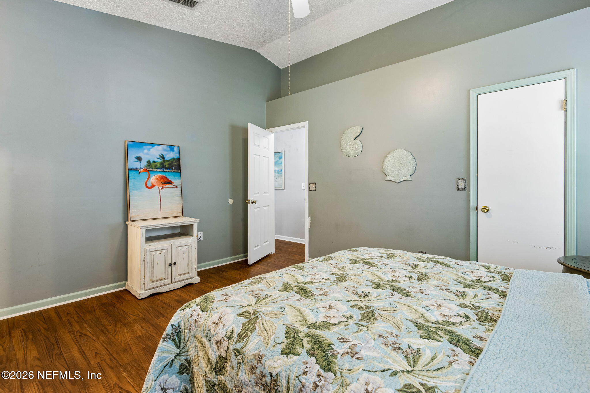 12648 Moose Road Jacksonville, FL 32226 - Photo 24 of 38 a bedroom with a bed and a dresser