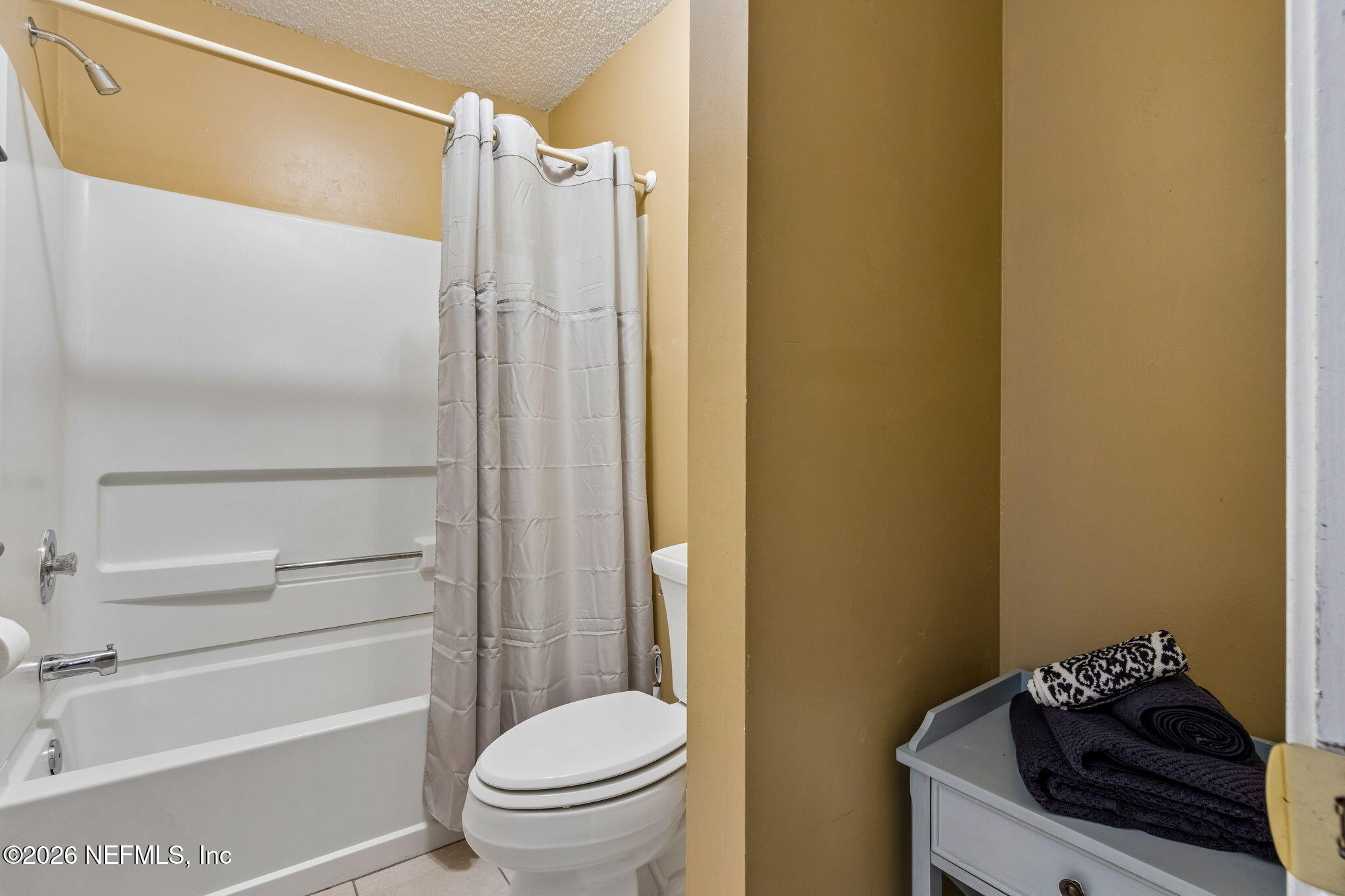 12648 Moose Road Jacksonville, FL 32226 - Photo 26 of 38 a bathroom with a shower a toilet and a sink