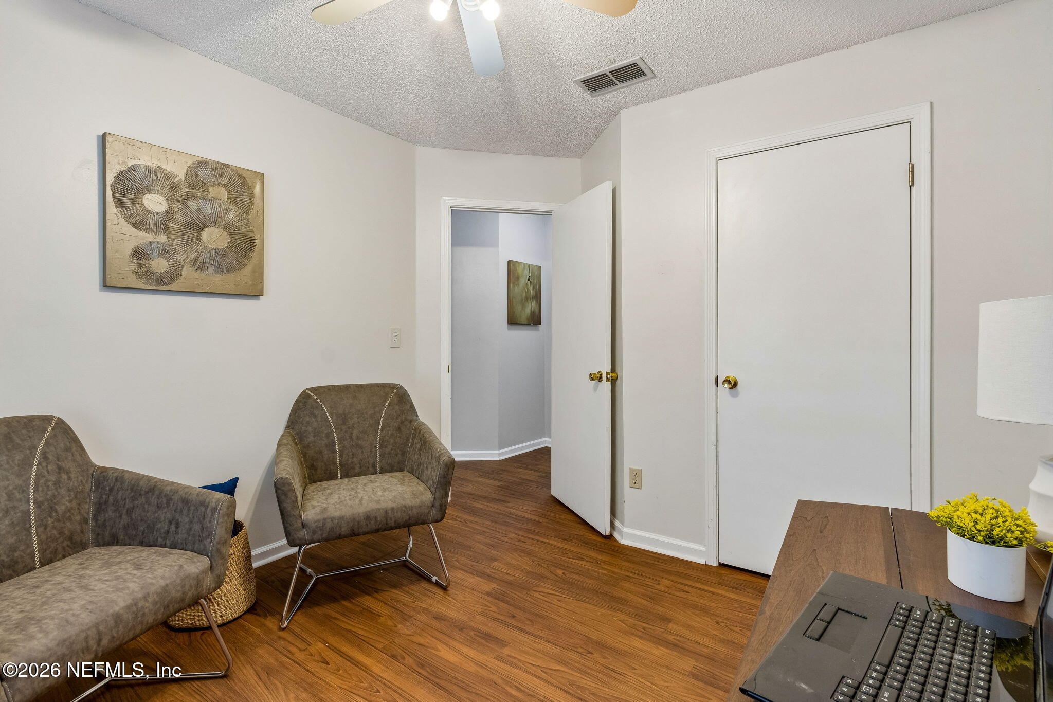 12648 Moose Road Jacksonville, FL 32226 - Photo 31 of 38 a living room with furniture and a chair