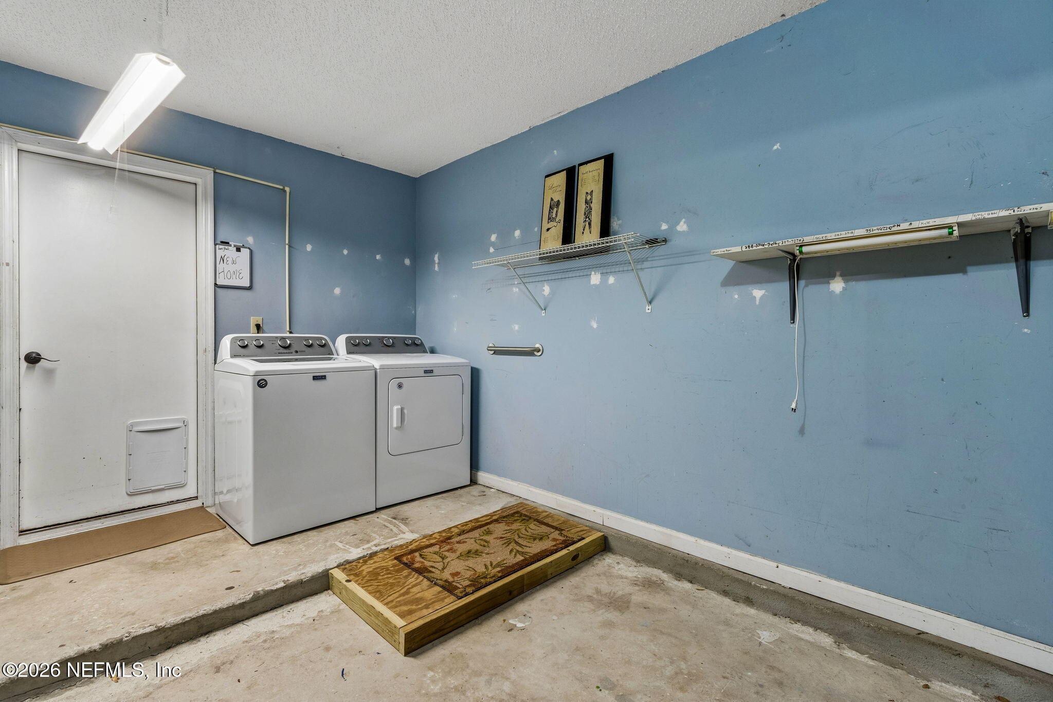 12648 Moose Road Jacksonville, FL 32226 - Photo 32 of 38 a utility room with dryer and washer