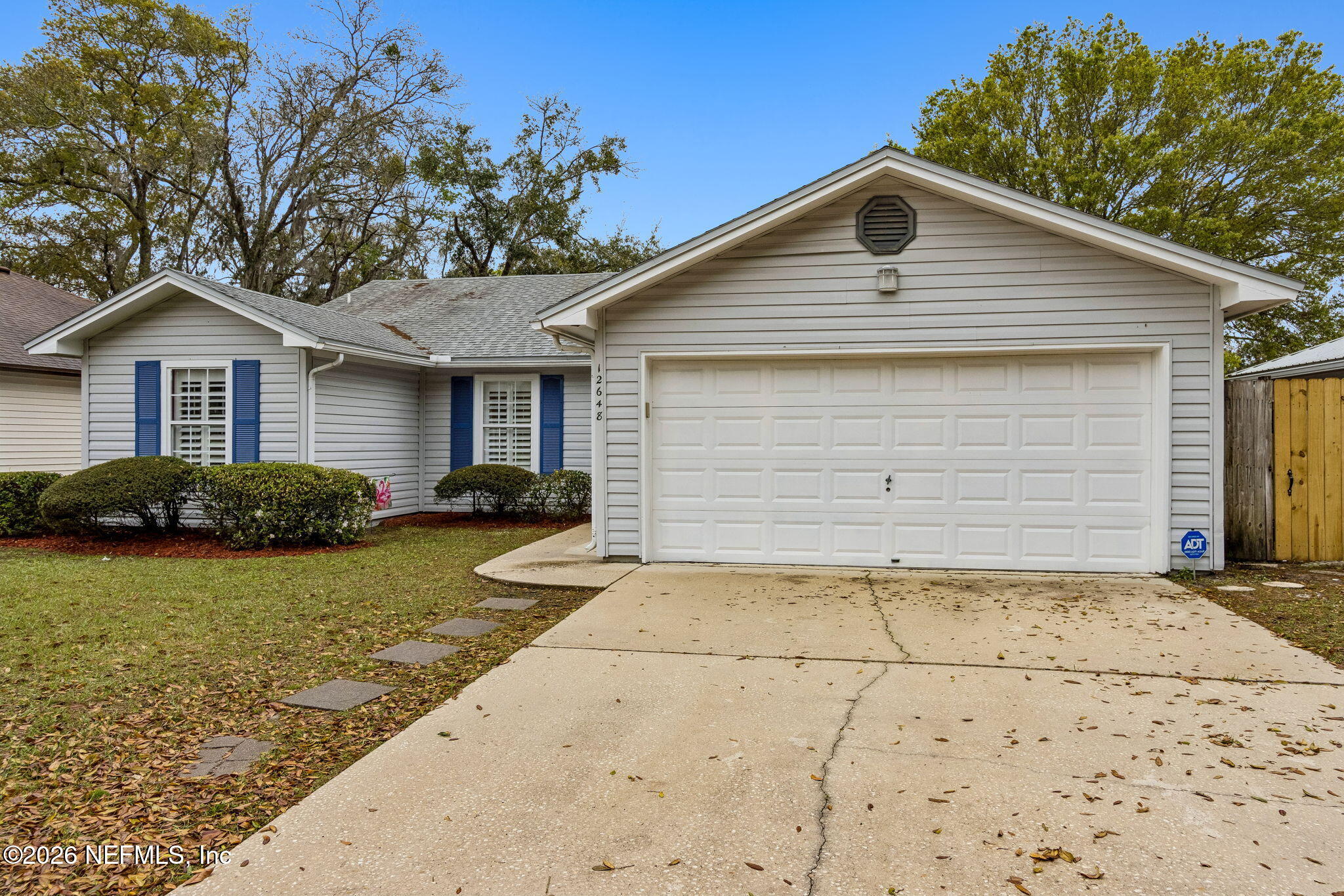 12648 Moose Road Jacksonville, FL 32226 - Photo 4 of 38 a front view of house with yard and trees around