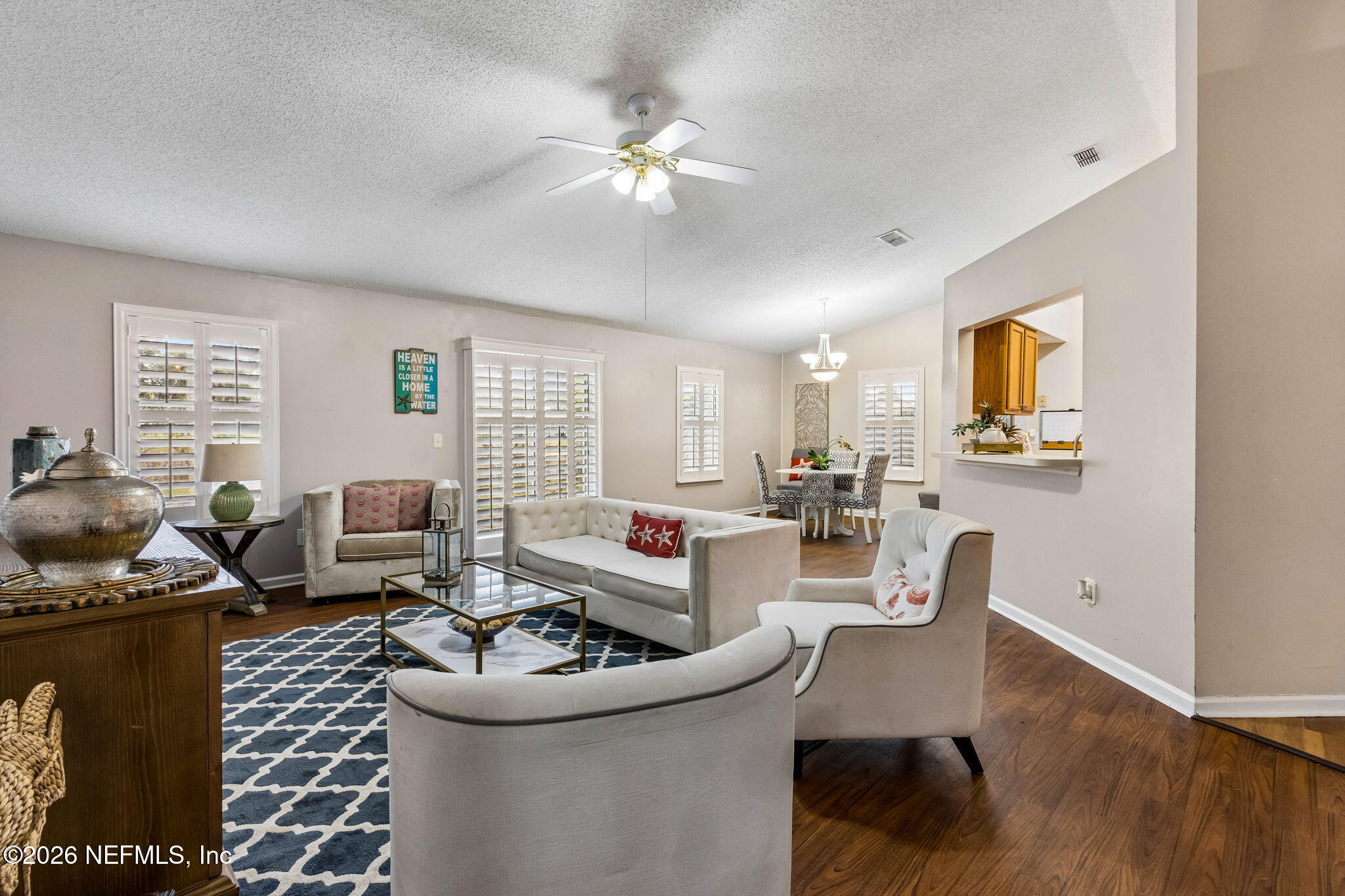 12648 Moose Road Jacksonville, FL 32226 - Photo 9 of 38 a living room with furniture and a large window