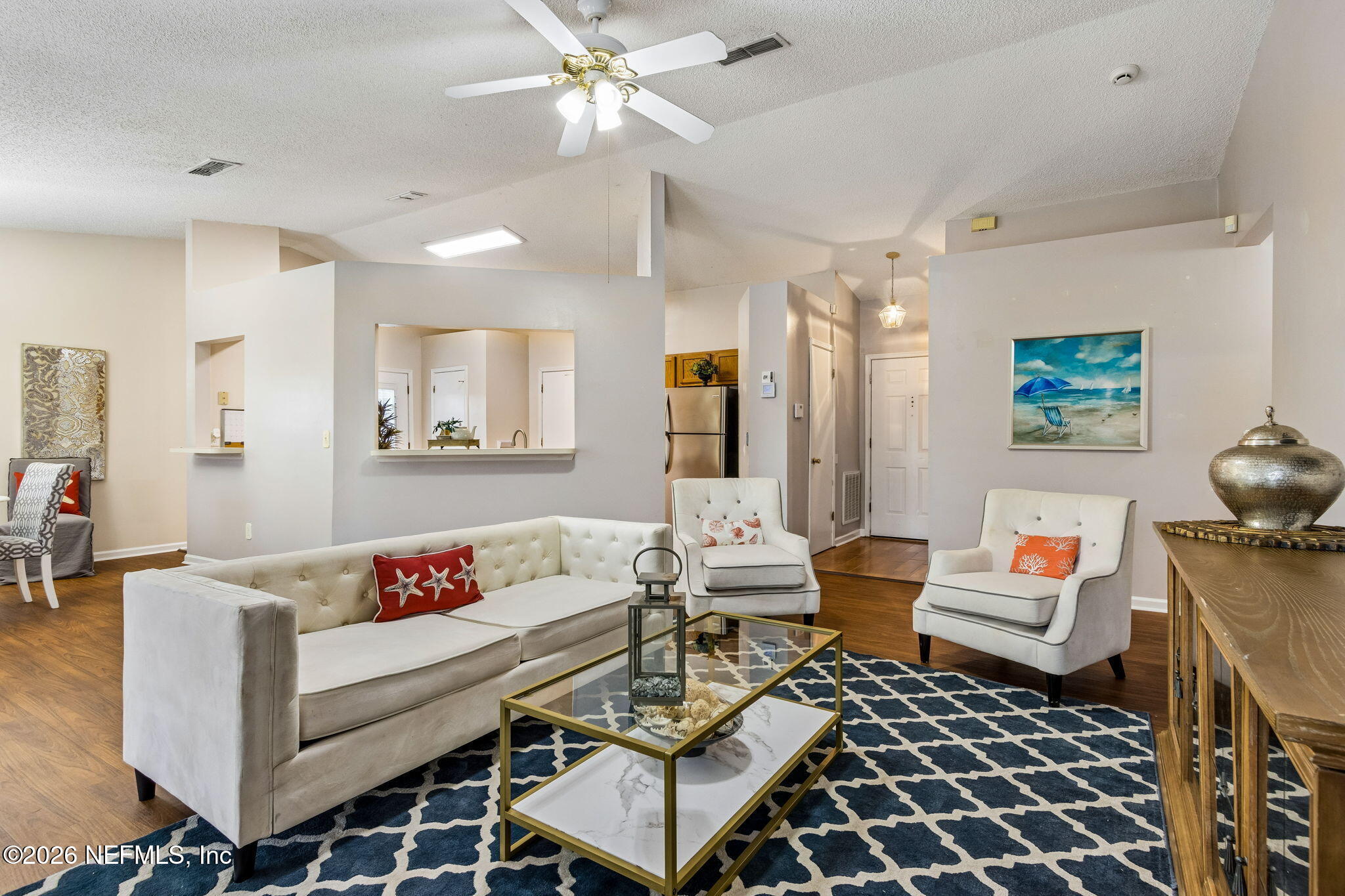 12648 Moose Road Jacksonville, FL 32226 - Photo 10 of 38 a living room with furniture and wooden floor