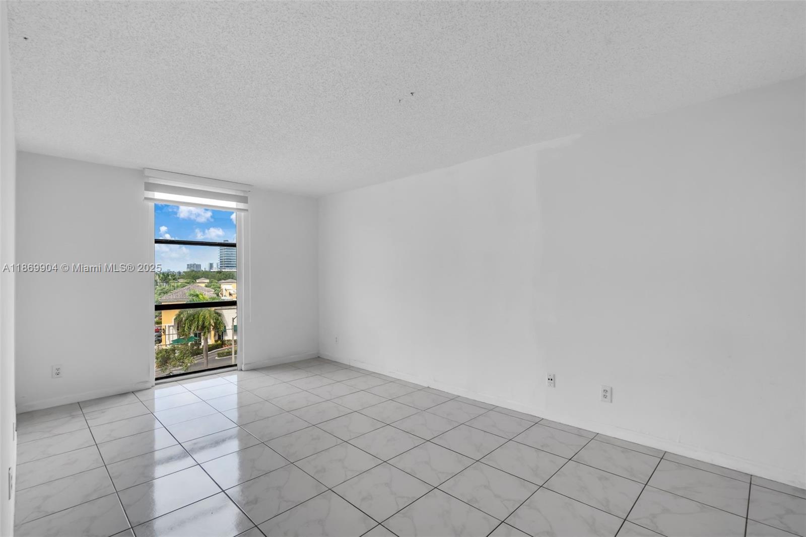 13499 Biscayne Boulevard, Unit 403 North Miami, FL 33181 - Photo 11 of 31 a view of an empty room with window