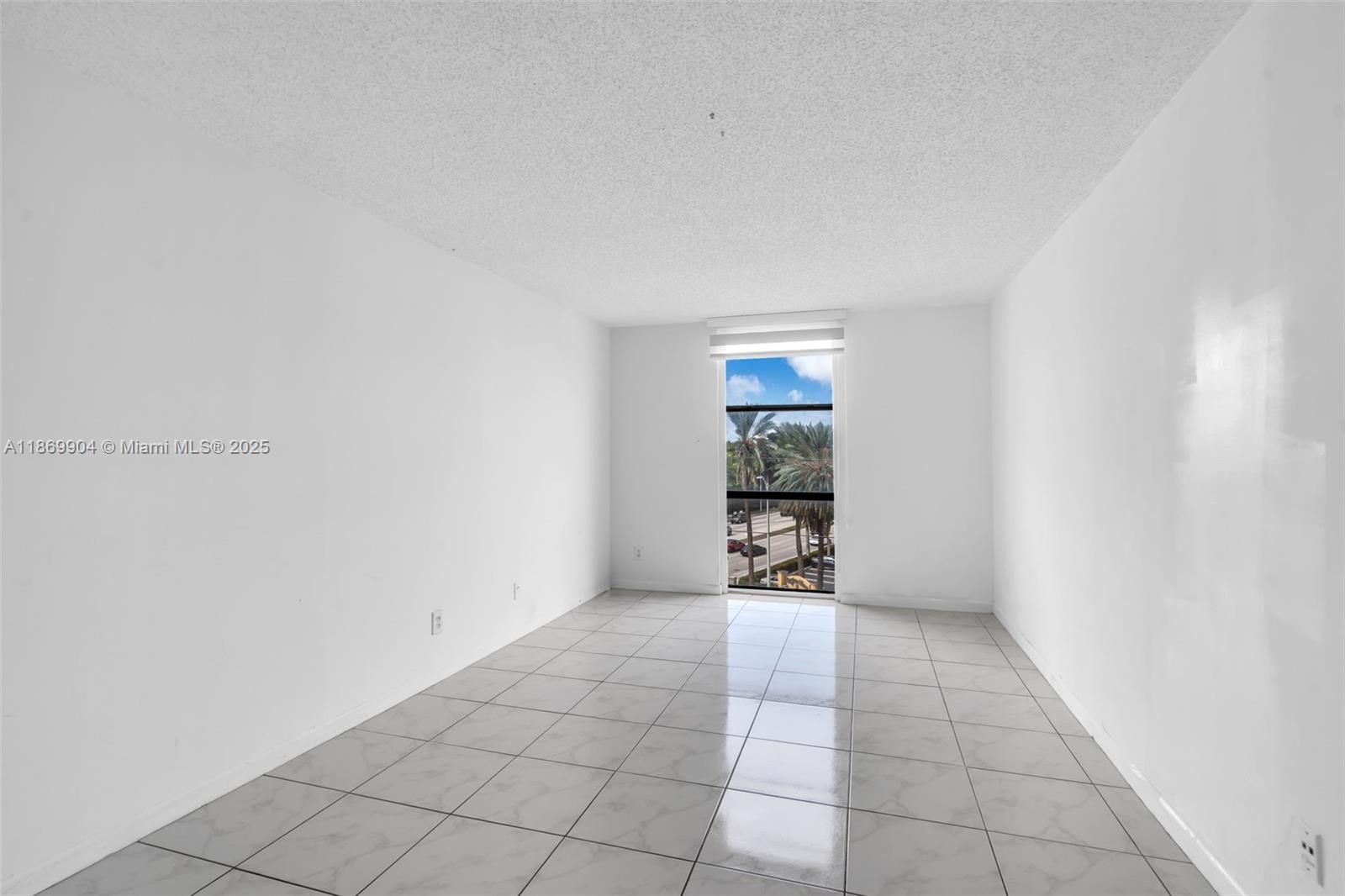 13499 Biscayne Boulevard, Unit 403 North Miami, FL 33181 - Photo 12 of 31 an empty room with windows