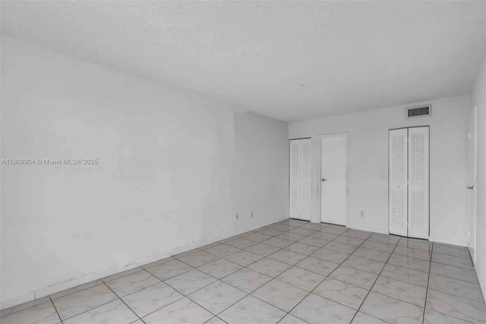 13499 Biscayne Boulevard, Unit 403 North Miami, FL 33181 - Photo 14 of 31 a view of an empty room
