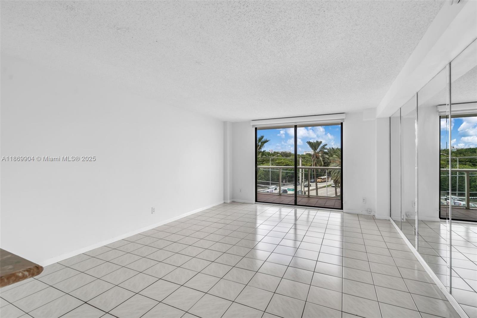 13499 Biscayne Boulevard, Unit 403 North Miami, FL 33181 - Photo 4 of 31 a view of an empty room with windows