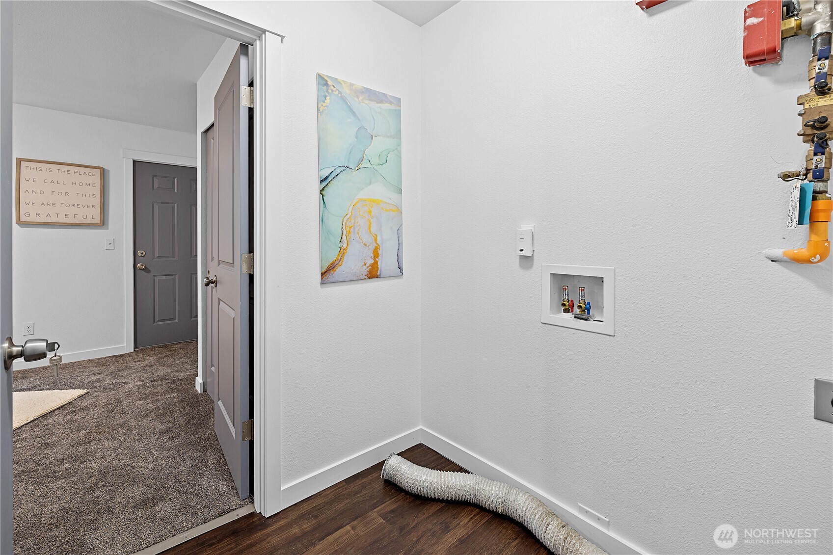 5621 South Lawrence Street, Unit C Tacoma, WA 98409 - Photo 23 of 29 a view of room with window and wooden floor