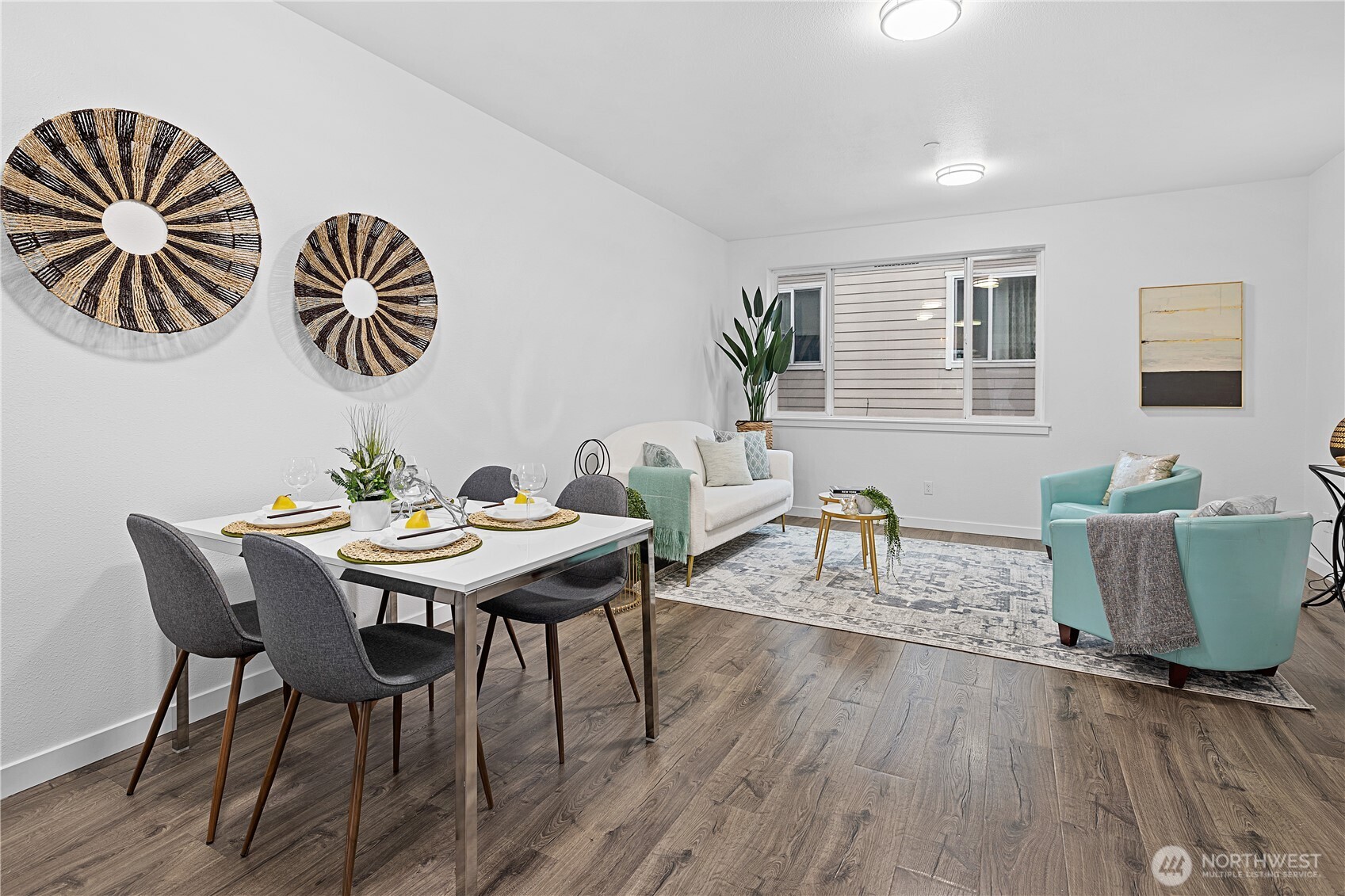 5621 South Lawrence Street, Unit C Tacoma, WA 98409 - Photo 10 of 29 a view of a dining room with furniture and wooden floor