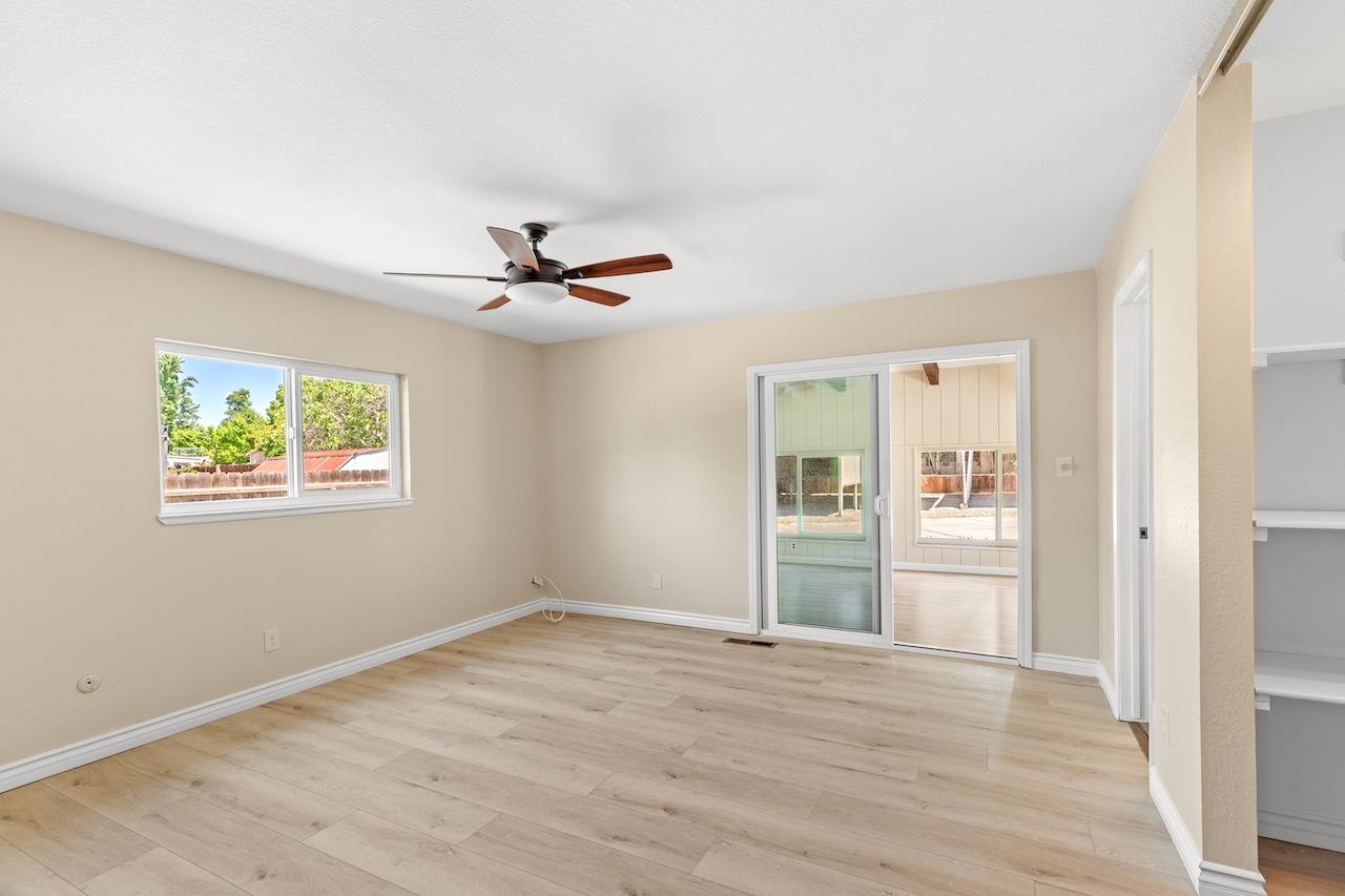 940 Constitution Way Tracy, CA 95376 - Photo 27 of 63 a view of empty room with wooden floor