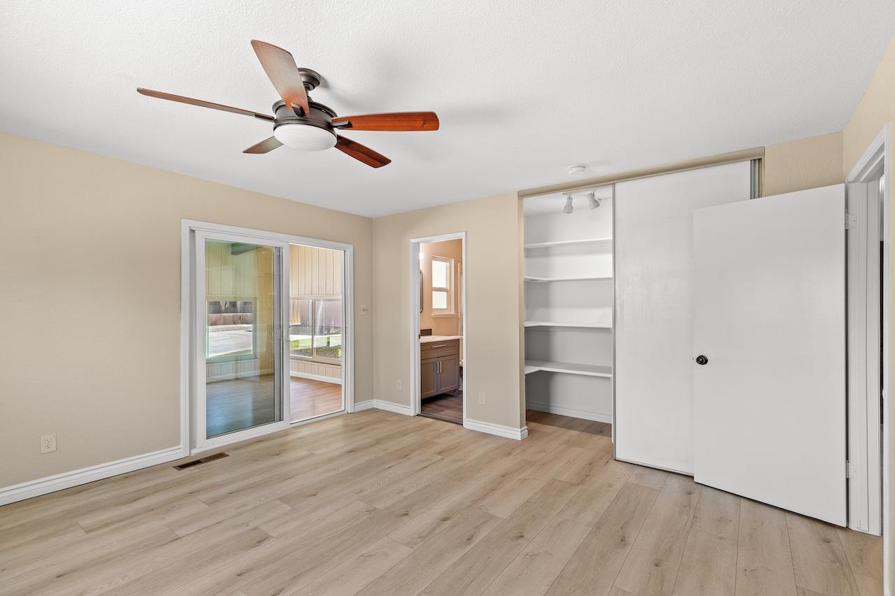 940 Constitution Way Tracy, CA 95376 - Photo 30 of 63 a view of empty room with wooden floor and window