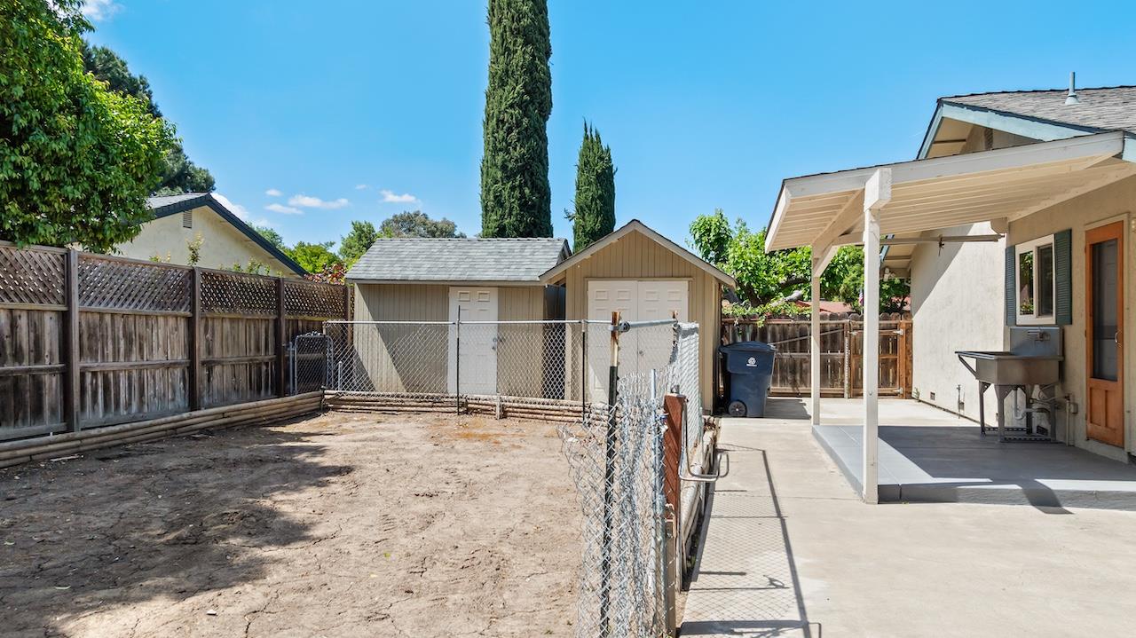 940 Constitution Way Tracy, CA 95376 - Photo 40 of 63 a front view of a house with a yard