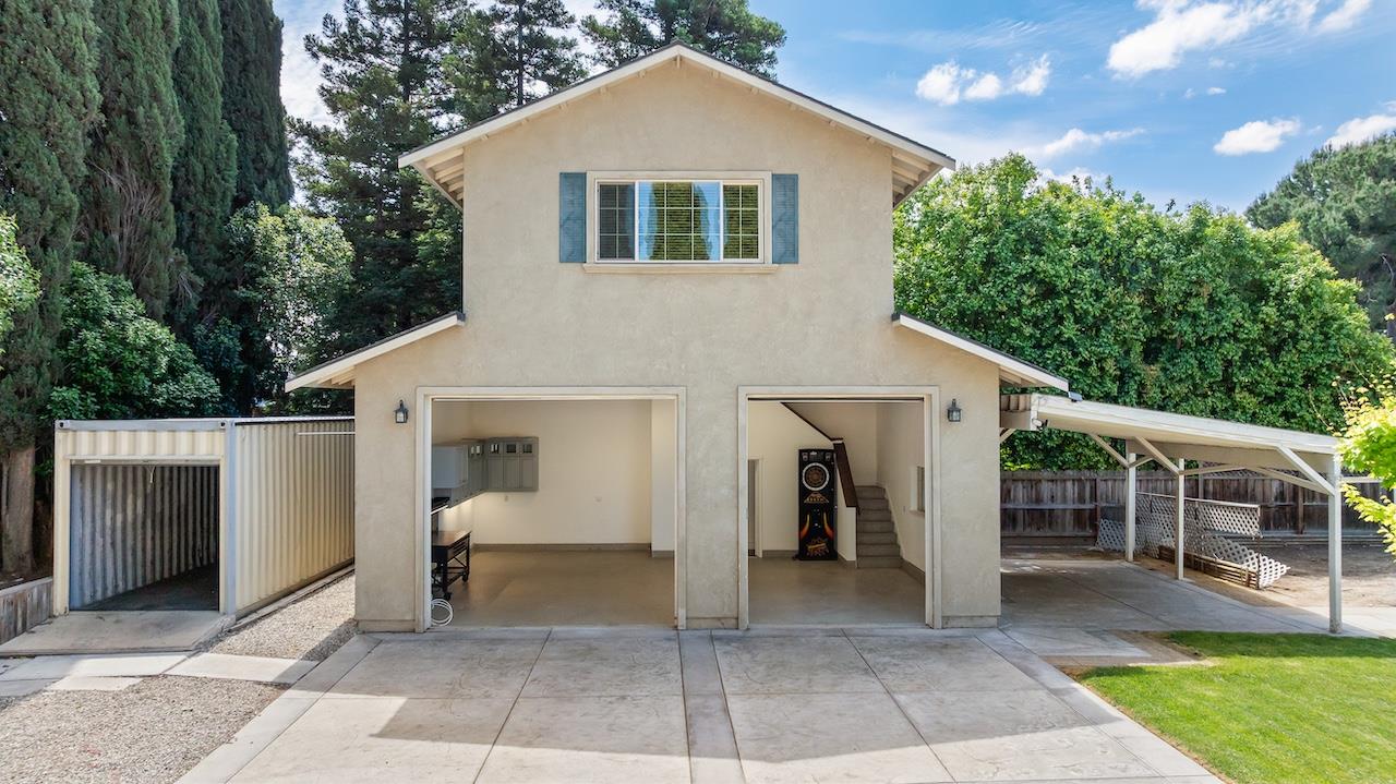 940 Constitution Way Tracy, CA 95376 - Photo 48 of 63 a front view of house with yard and outdoor seating