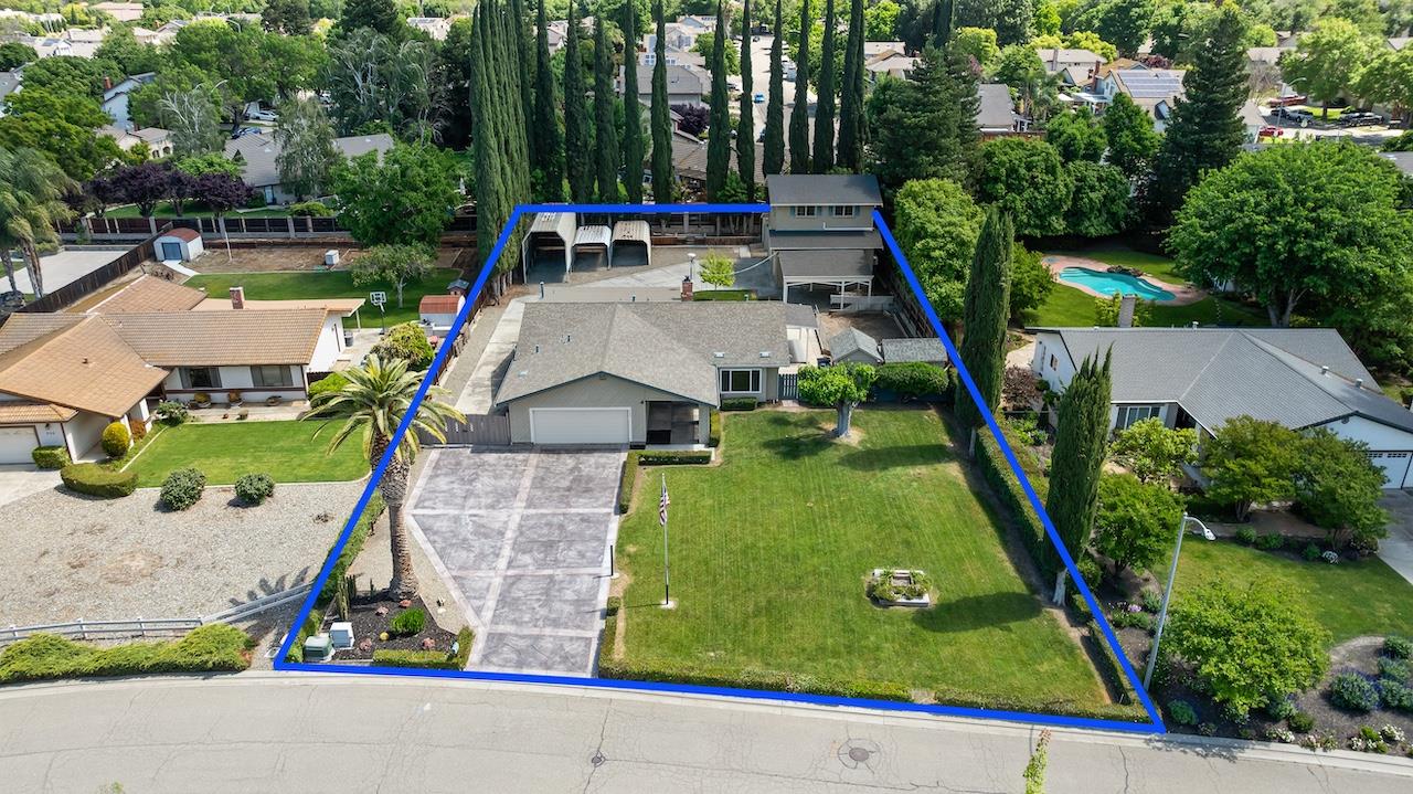 940 Constitution Way Tracy, CA 95376 - Photo 60 of 63 an aerial view of a house with a yard basket ball court and outdoor seating