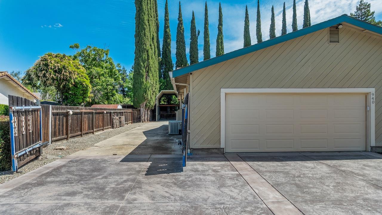 940 Constitution Way Tracy, CA 95376 - Photo 8 of 63 a view of a house with wooden fence