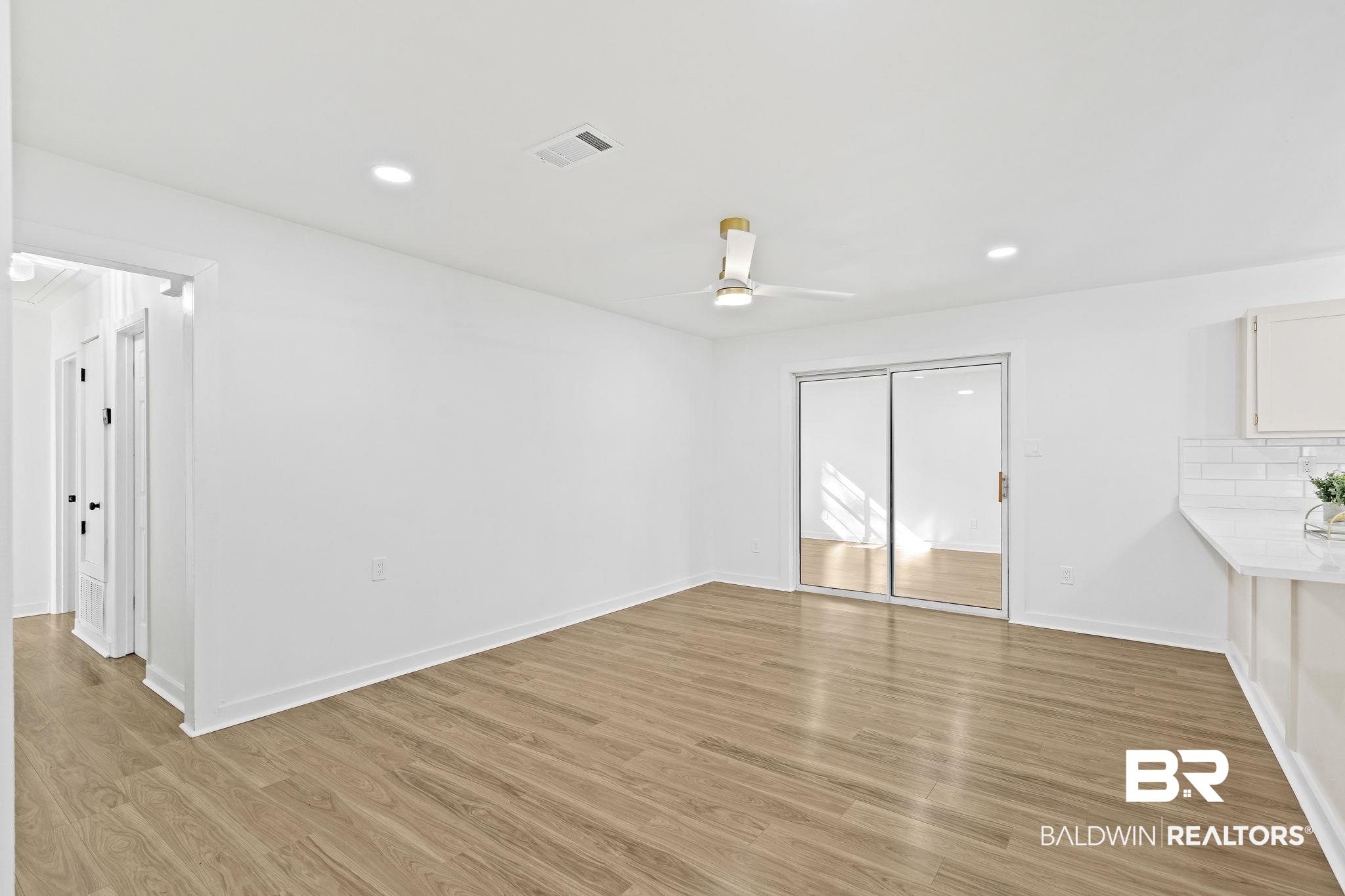 5398 Quail Run North Theodore, AL 36582 - Photo 33 of 46 Interior space featuring ceiling fan and light hardwood / wood-style flooring
