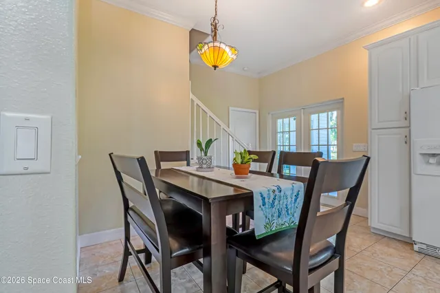 a view of a dining room and chairs