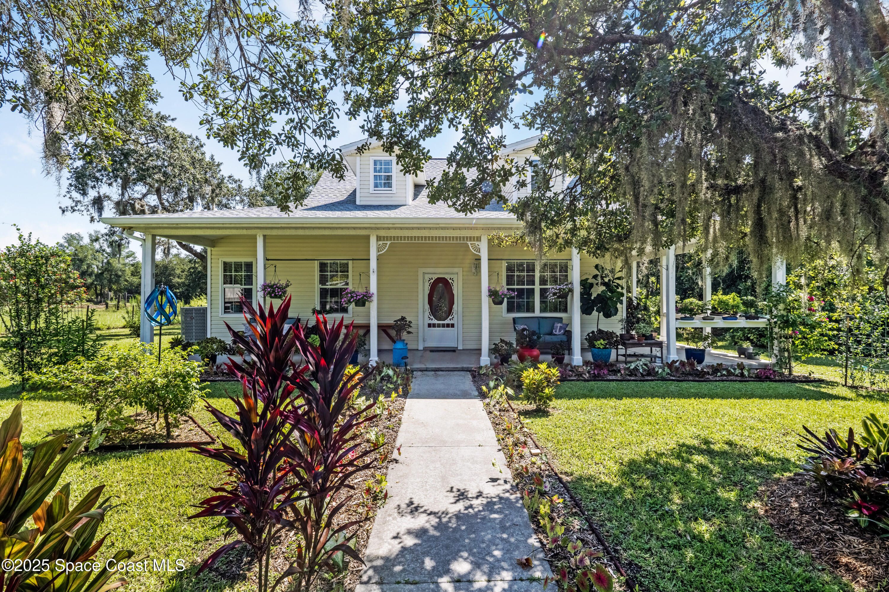3931 U.S. Rte 1 Mims, FL 32754 - Photo 3 of 47 a view of a house with swimming pool and sitting area