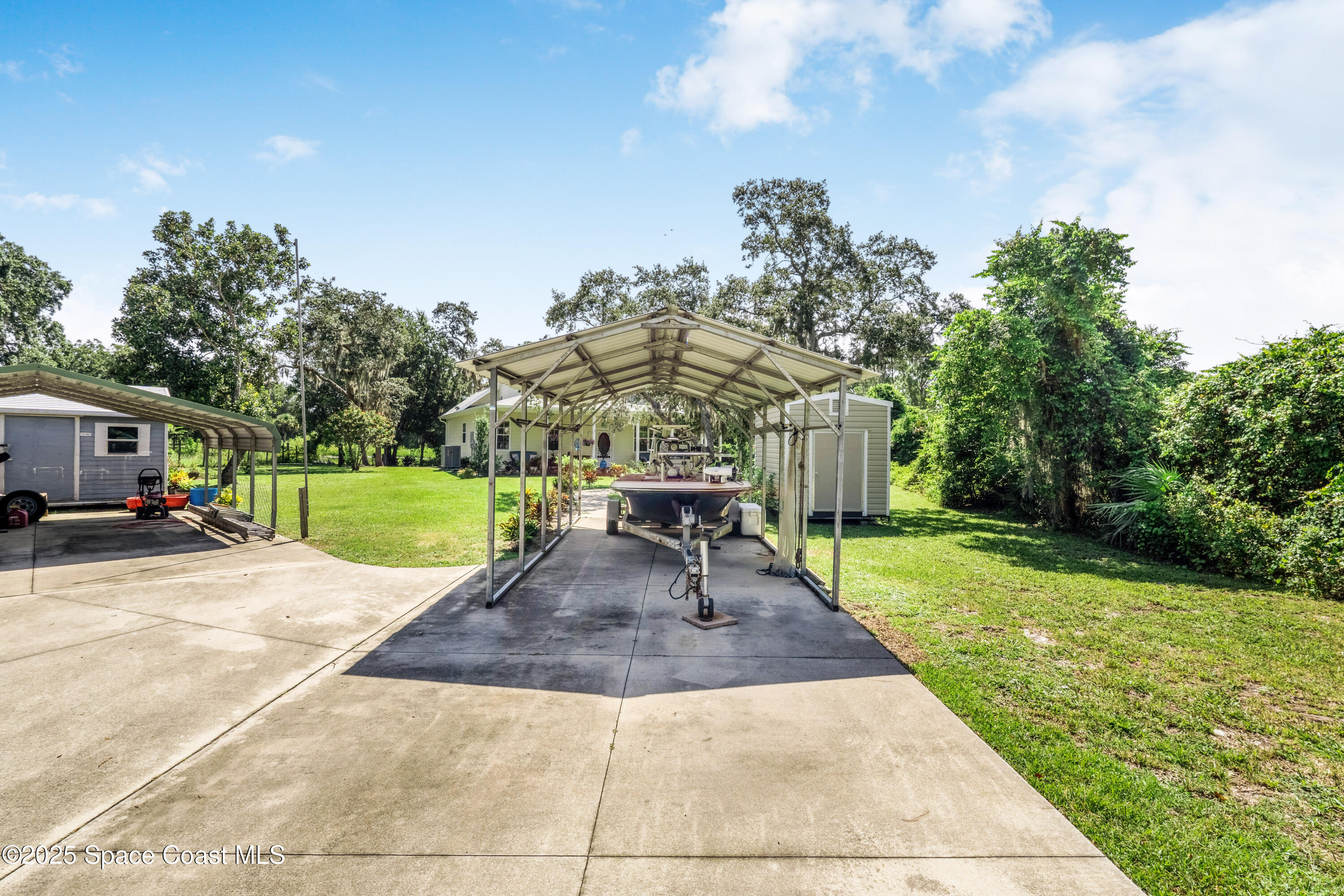 3931 U.S. Rte 1 Mims, FL 32754 - Photo 39 of 47 a view of a house with garden and a trees