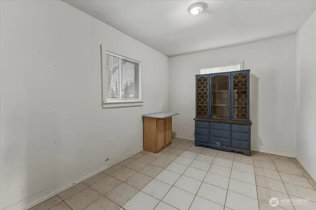 an empty room and window