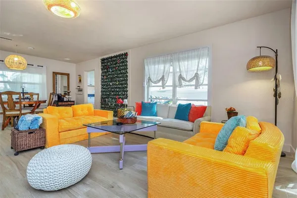 a house view with a sitting space and garden