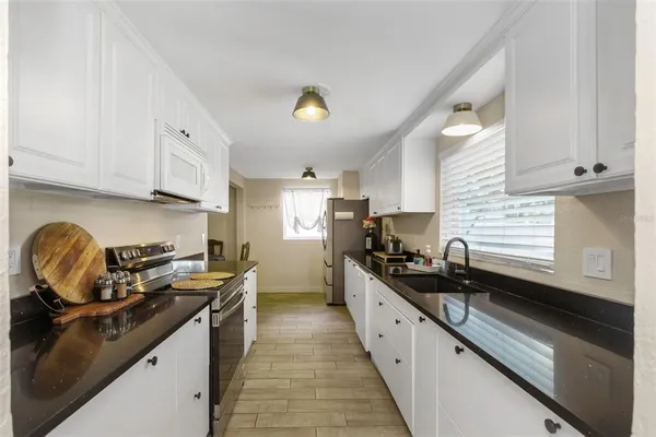 a bathroom with a sink and a cabinet