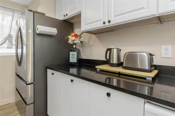 a view of a dining room with furniture