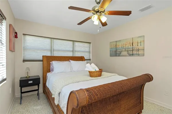 a bathroom with a sink mirror and toilet