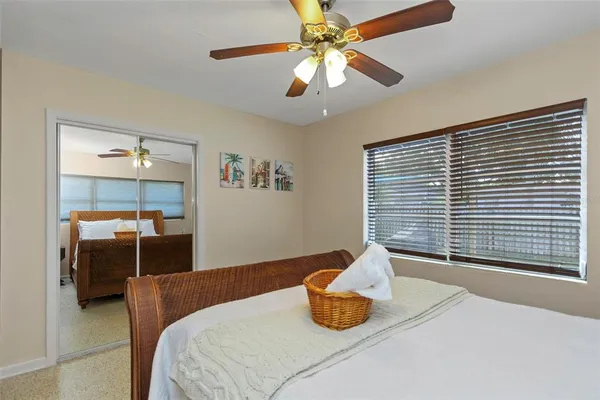 a bathroom with a sink mirror and a shower