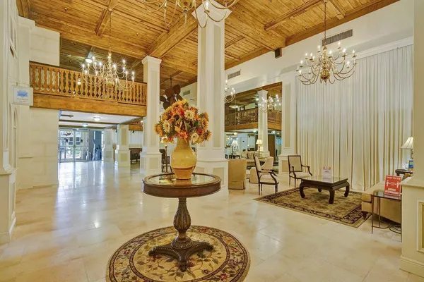 a view of a patio with a table and chairs