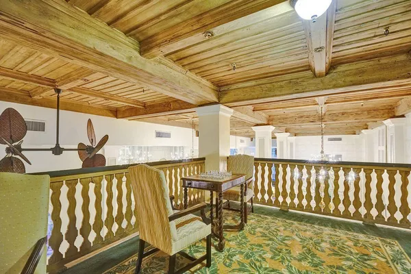 a living room with furniture and flat screen tv