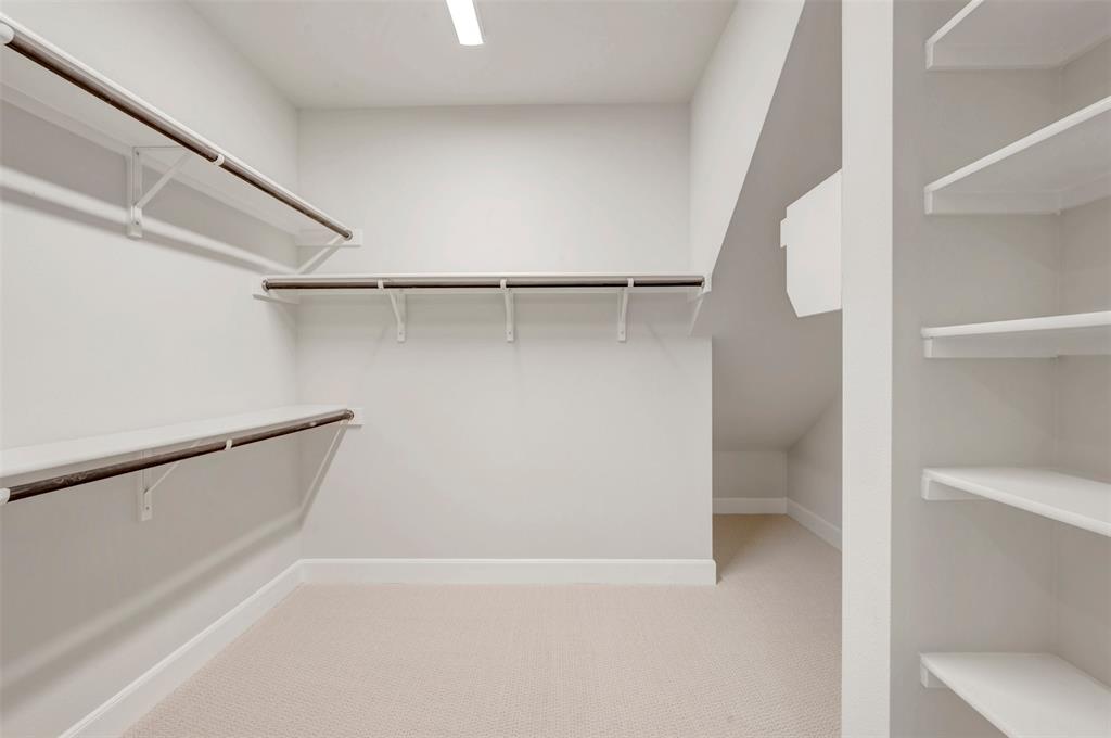 4308 Palomino Road Aubrey, TX 76227 - Photo 31 of 40 a view of an empty walk in closet