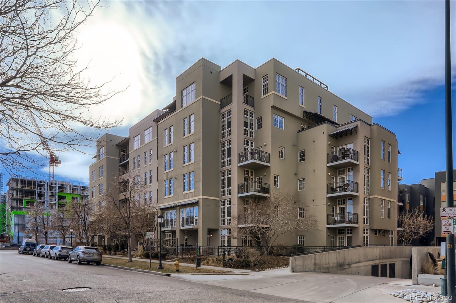275 South Harrison Street, Unit 602 Denver, CO 80209 - Photo 26 of 33 a front view of a building with street
