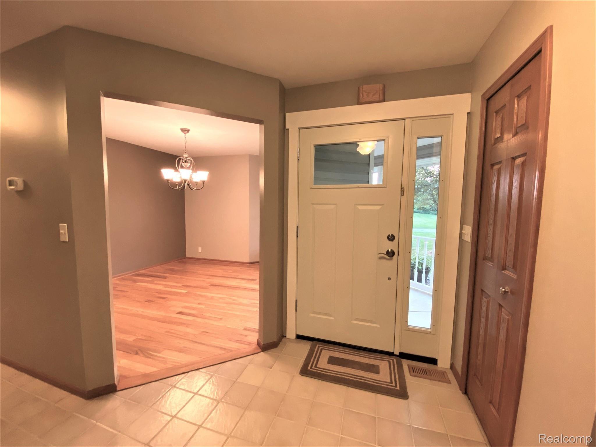 4191 West Coon Lake Road Howell, MI 48843 - Photo 8 of 32 Foyer with full closet.JPG