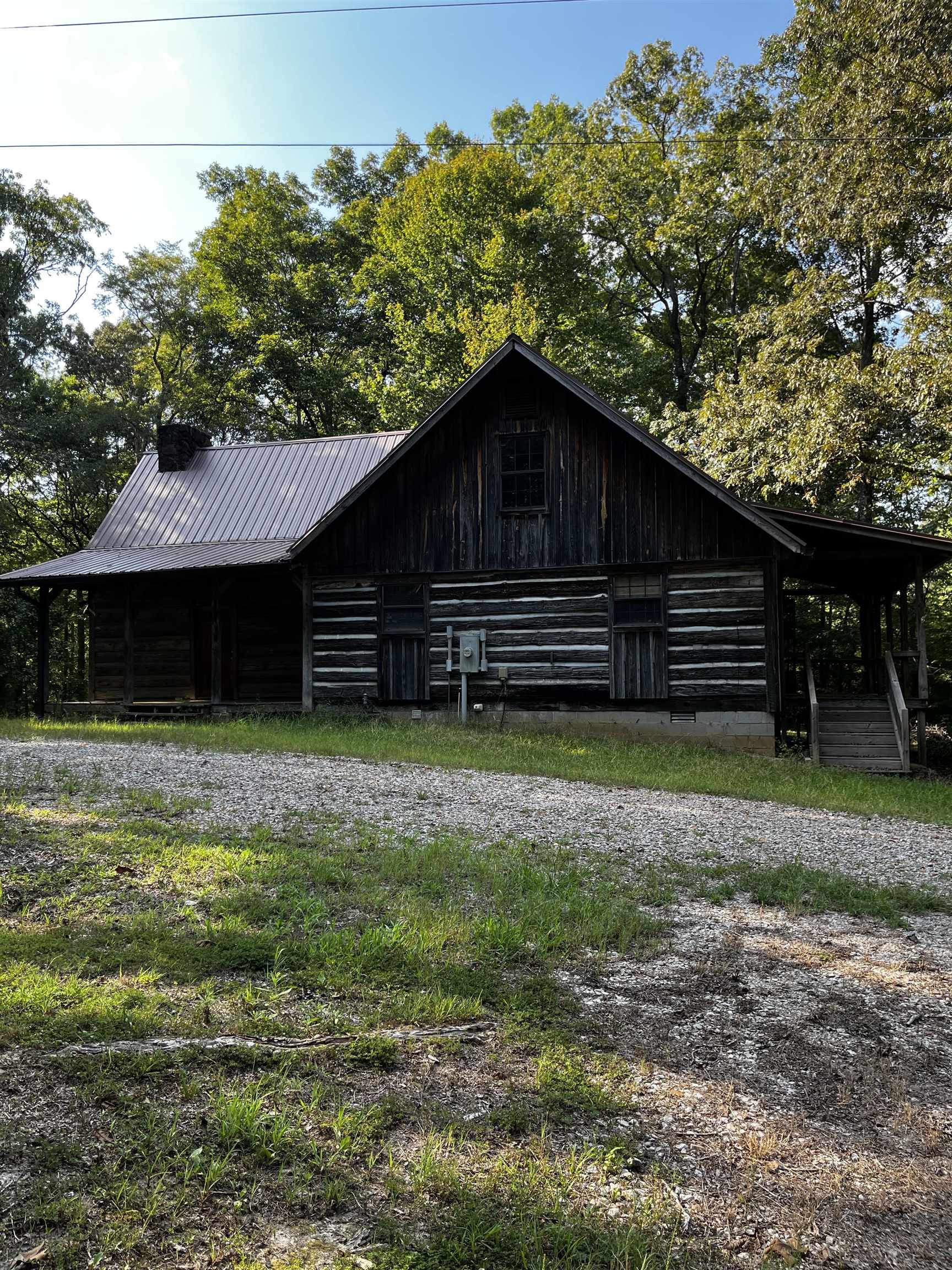 1800 Mt Gilead Road Bethel Springs, TN 38315 - Photo 12 of 13 a front view of a house with a yard