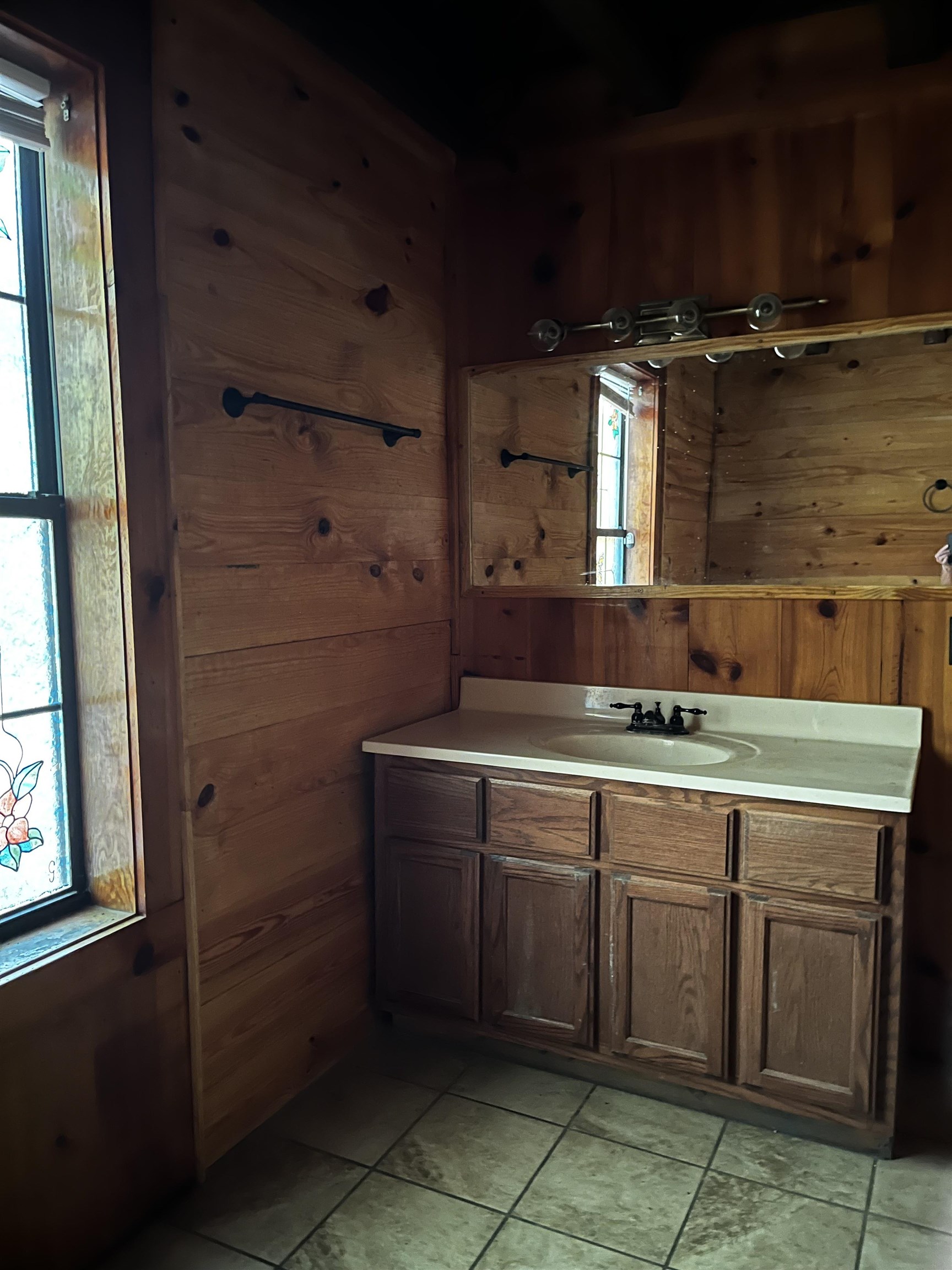 1800 Mt Gilead Road Bethel Springs, TN 38315 - Photo 5 of 13 a kitchen with a sink and cabinets