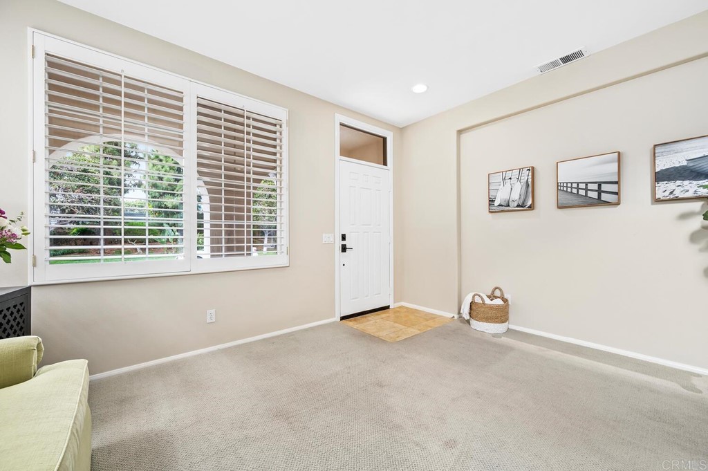 533 Anchorage Avenue Carlsbad, CA 92011 - Photo 18 of 58 a view of an empty room with a window