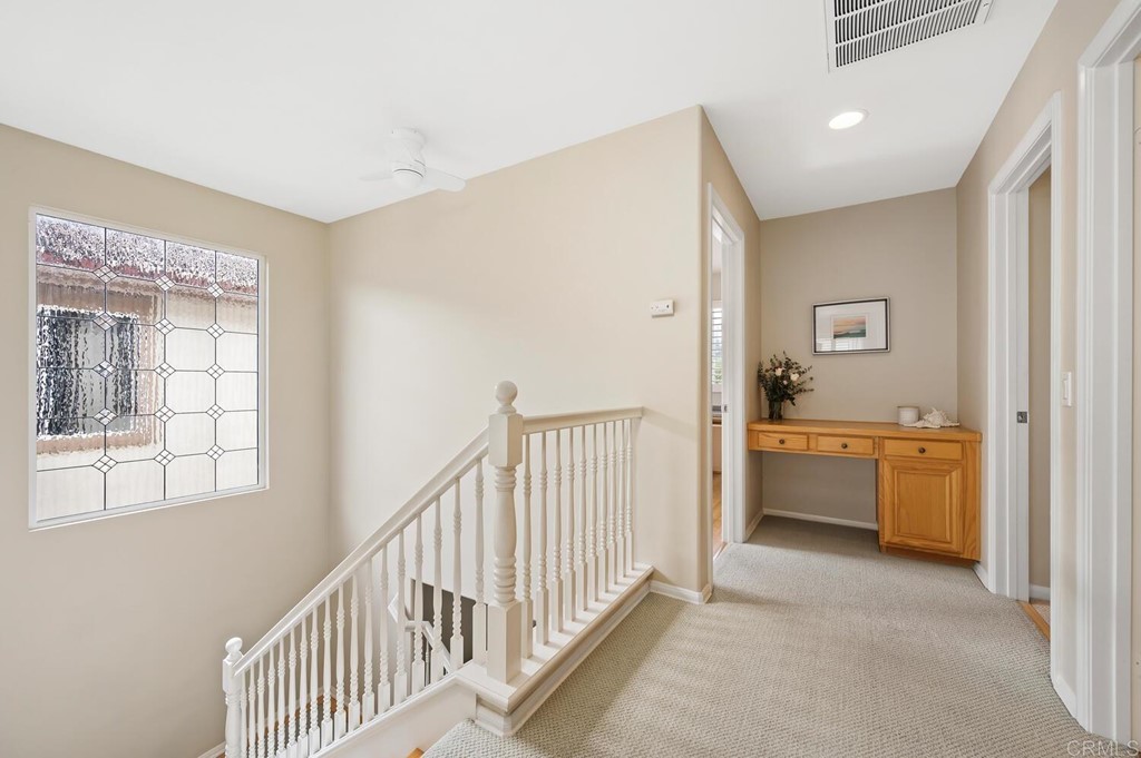 533 Anchorage Avenue Carlsbad, CA 92011 - Photo 20 of 58 a view of a hallway with bathroom and bathroom