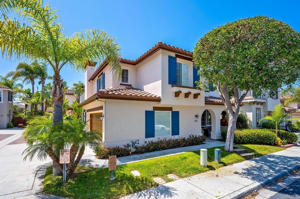 533 Anchorage Avenue Carlsbad, CA 92011 - Photo 2 of 58 a front view of a house with garden