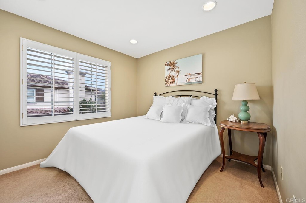533 Anchorage Avenue Carlsbad, CA 92011 - Photo 27 of 58 a bedroom with a bed and a window