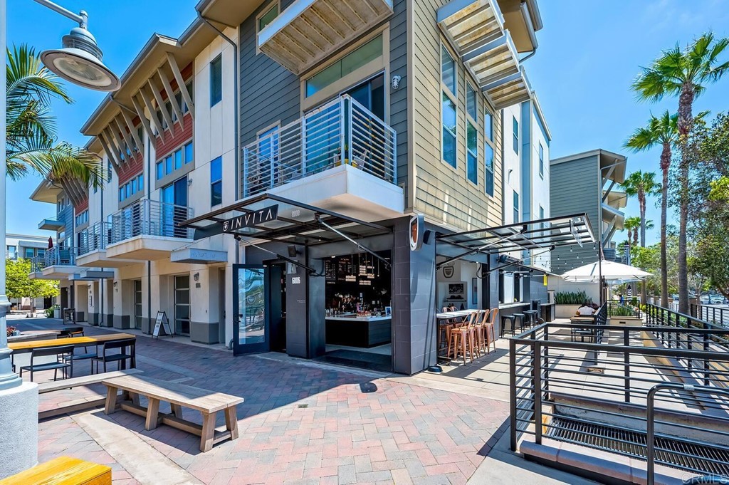 533 Anchorage Avenue Carlsbad, CA 92011 - Photo 58 of 58 a view of a building with sitting area and furniture