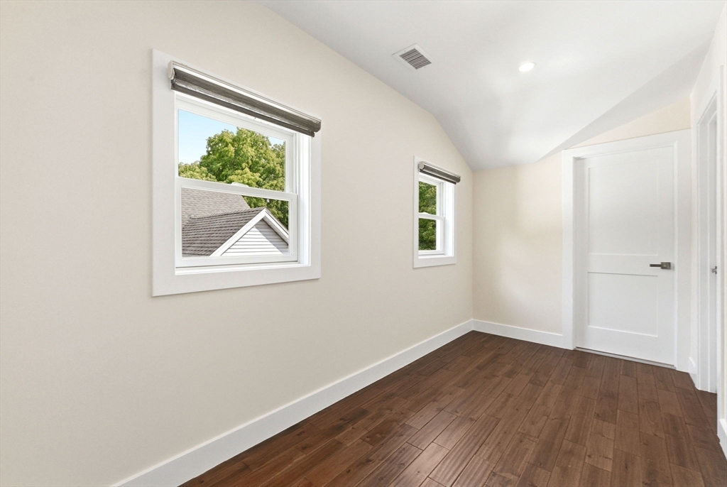 123 Nottinghill Road, Unit 2 Boston, MA 02135 - Photo 13 of 30 an empty room with a window