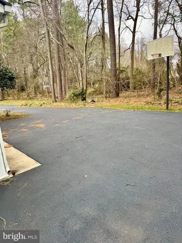 a view of swimming pool with a yard