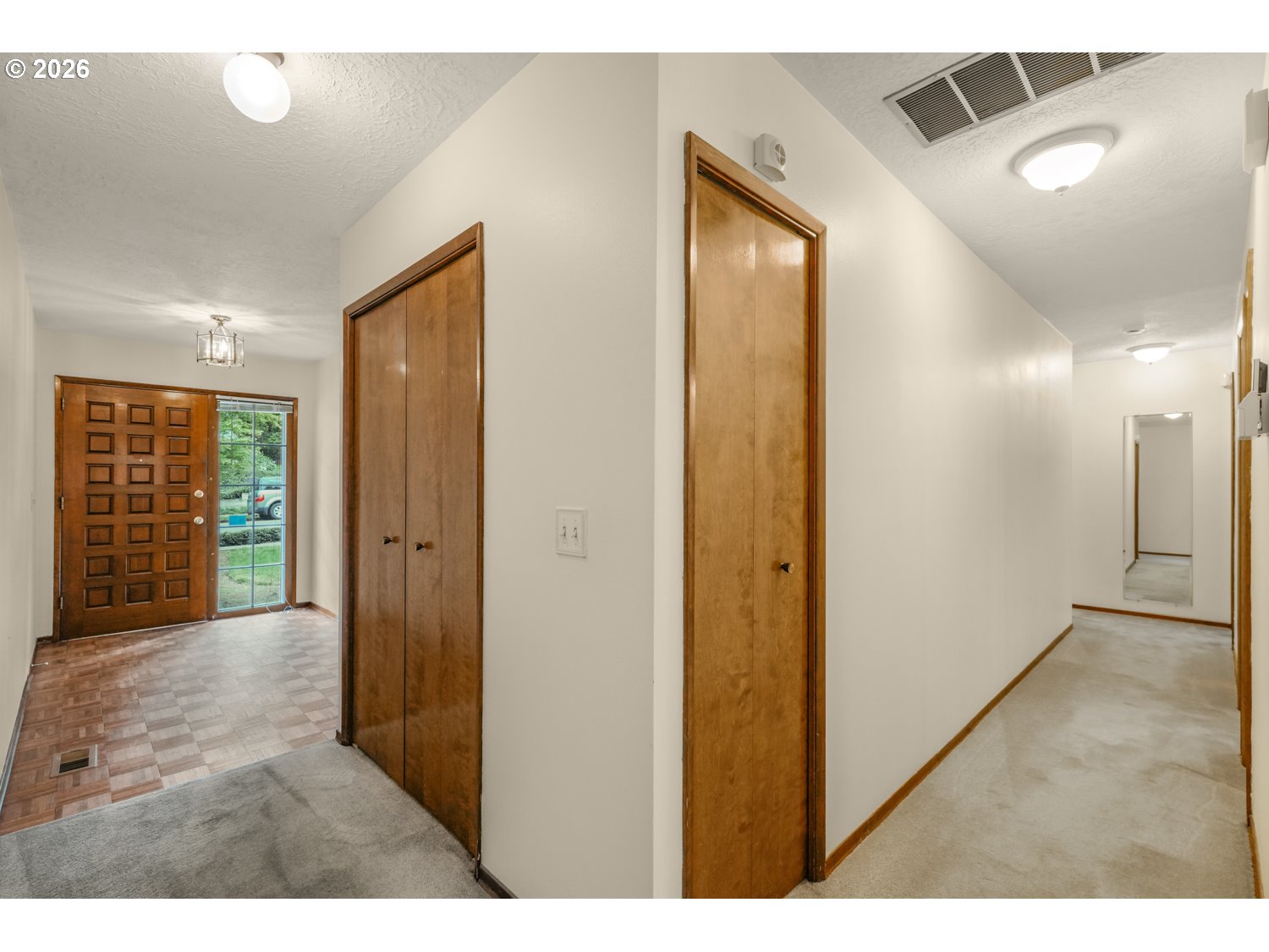 14155 Southwest 27th Street Beaverton, OR 97008 - Photo 16 of 27 a view of a hallway with wooden floor