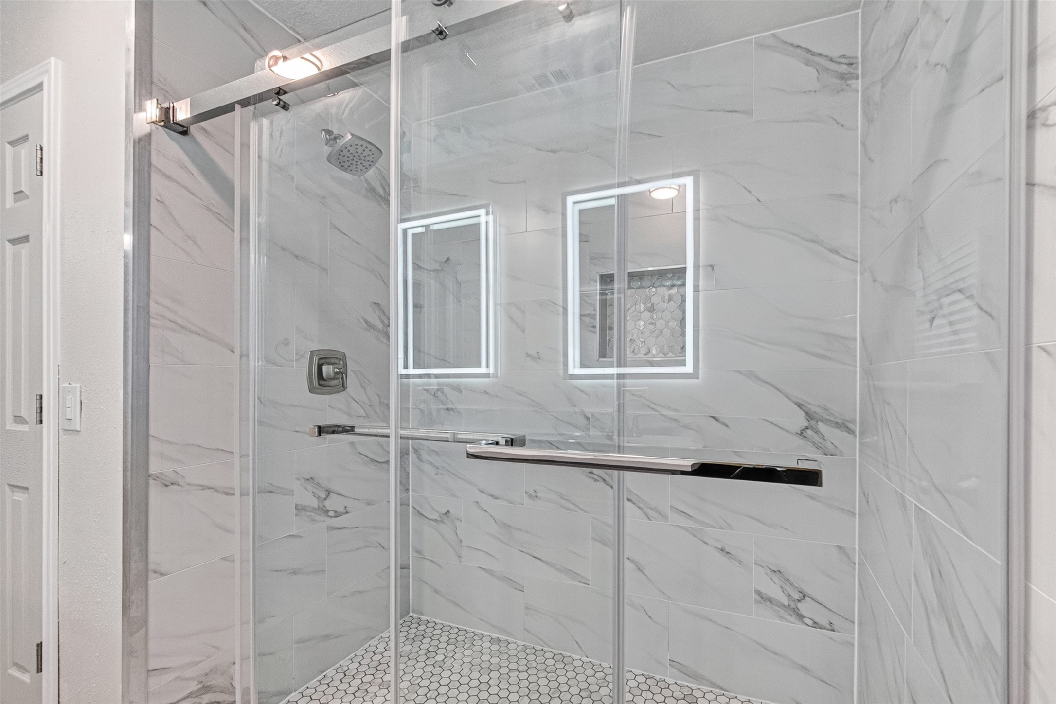 25503 Foxbriar Lane Spring, TX 77373 - Photo 36 of 45 a bathroom with a shower and a sink