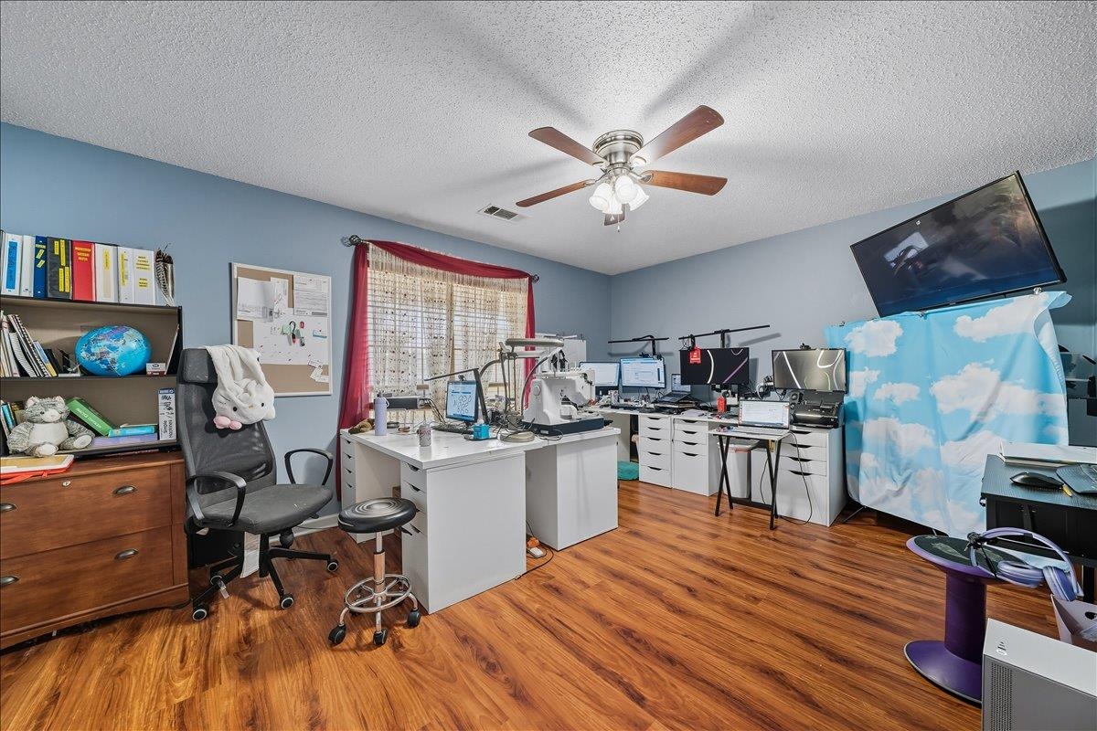 6870 Deerfield Road Bartlett, TN 38135 - Photo 14 of 28 Office with light wood finished floors, a textured ceiling, and a ceiling fan