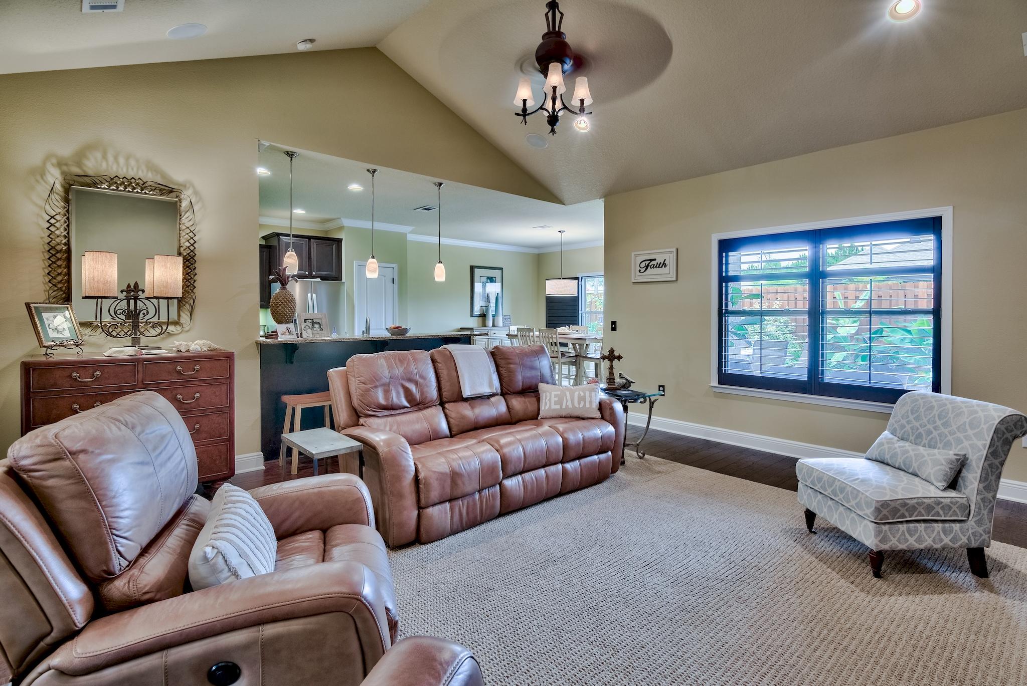 386 Pin Oak Loop Santa Rosa Beach, FL 32459 - Photo 12 of 47 a living room with furniture and a large window